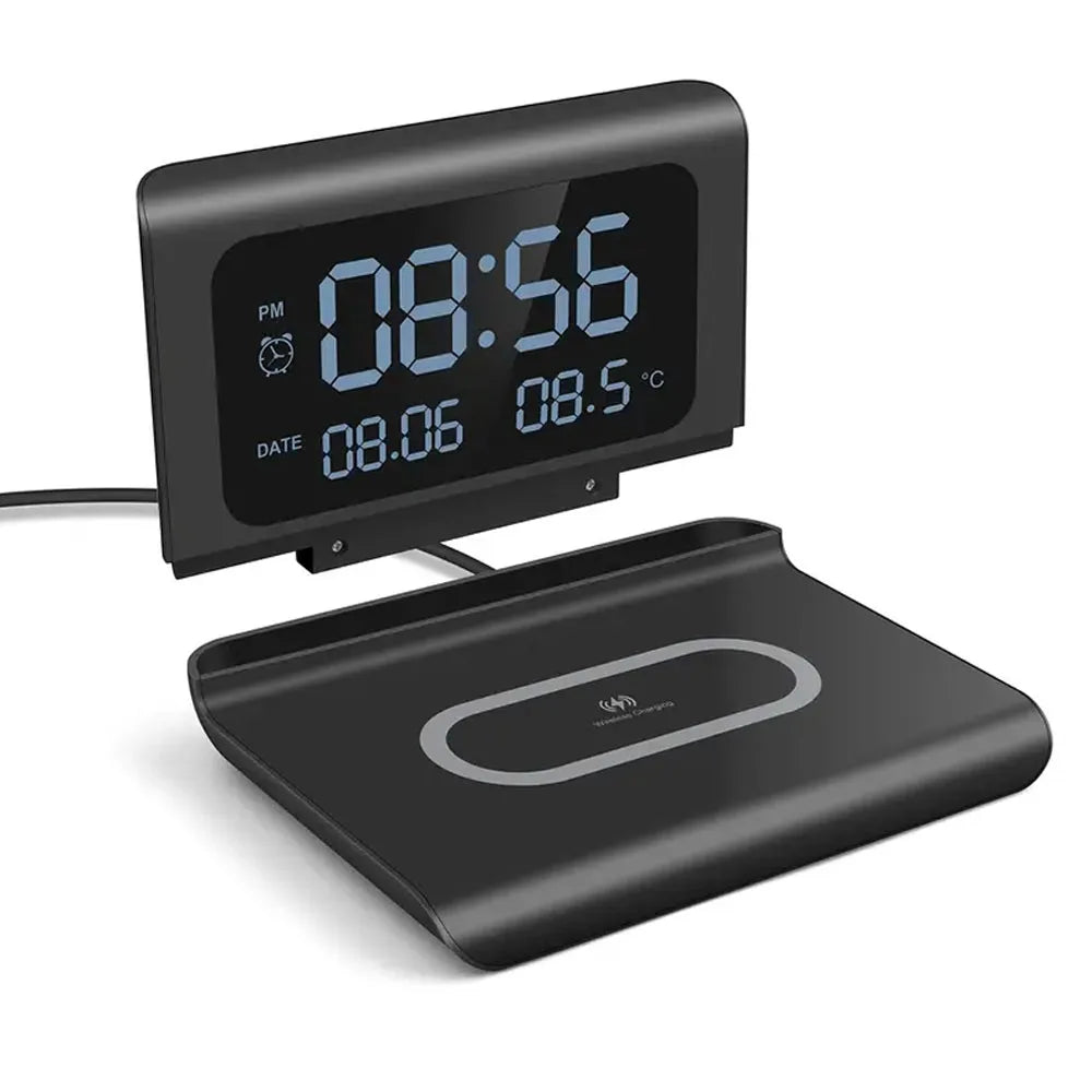 Black digital clock with temperature display on a white background