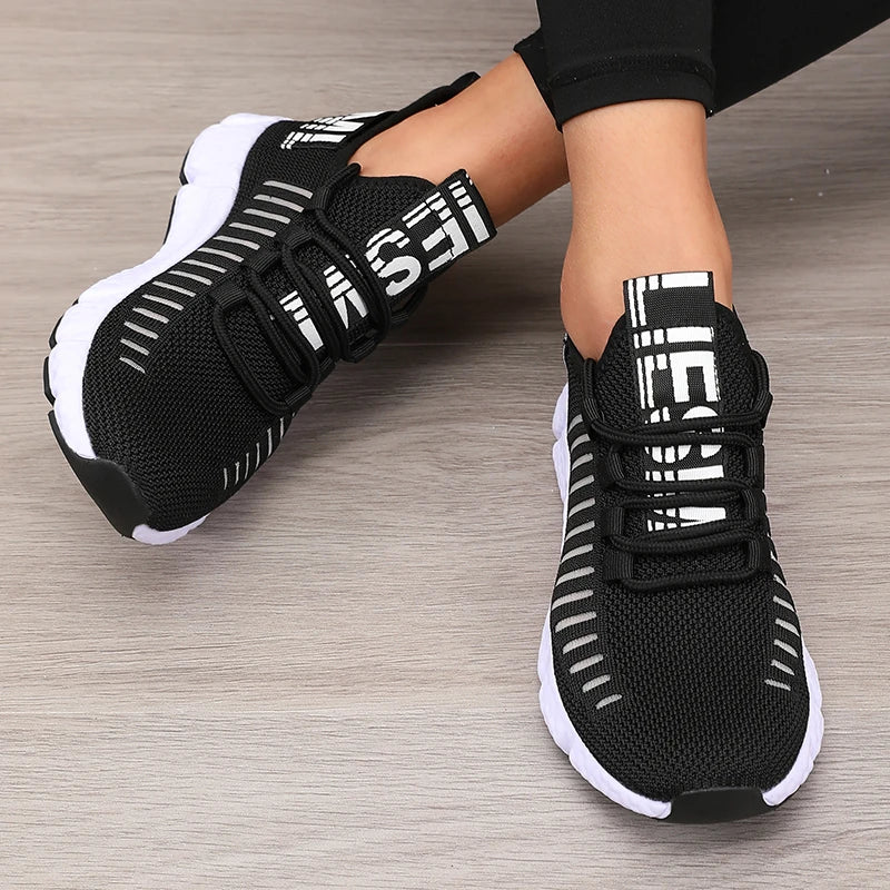 Black and white cute womens sneakers lightweight for walking, standing all day.