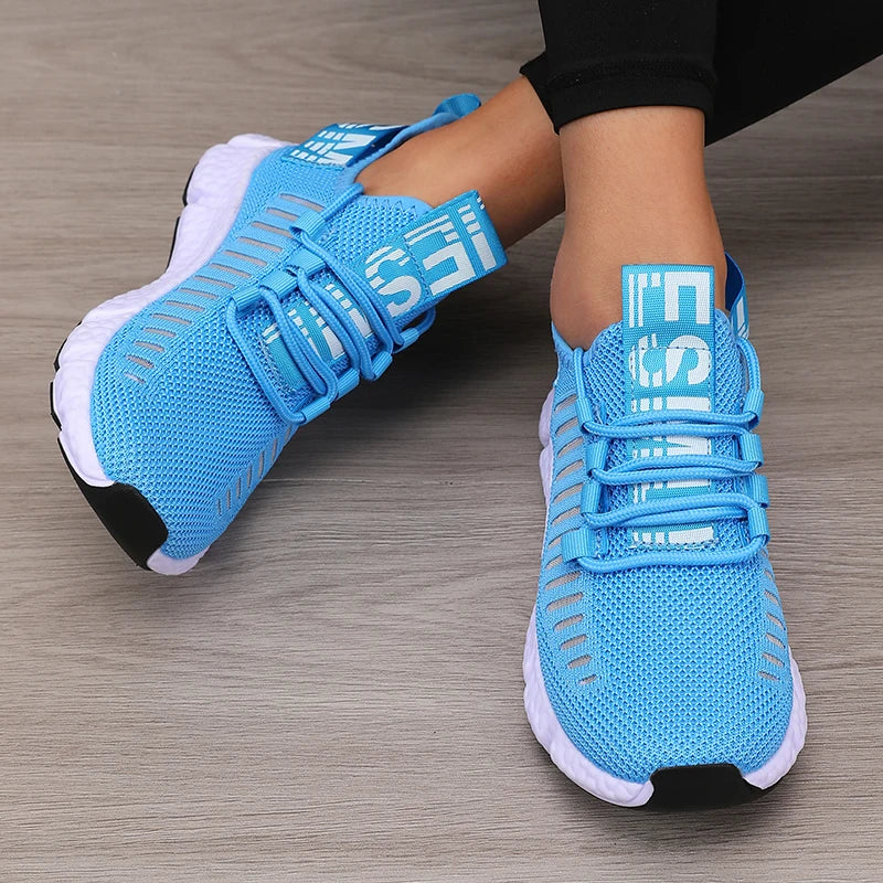 Blue athletic women's sneakers walking comfortable.