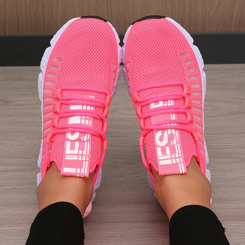 Pink rose red women's sneakers walking running soft light shoes with white soles.