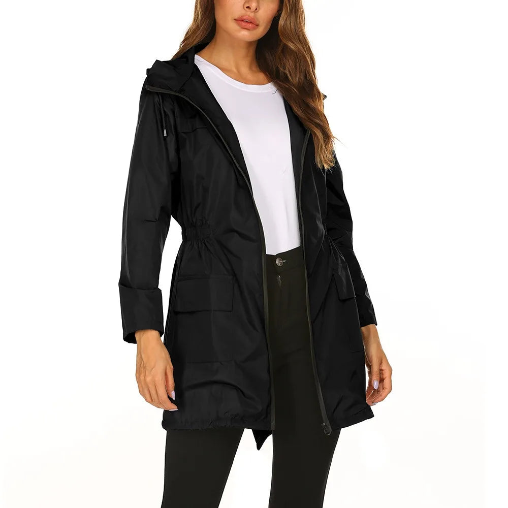 Black coat worn by a model on a white background