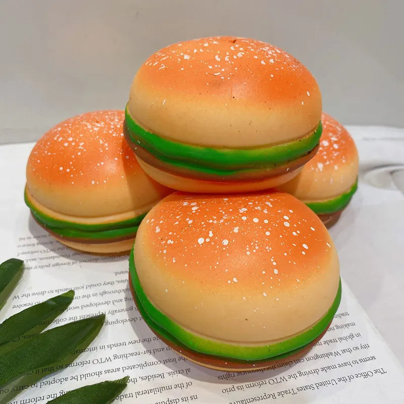 Hamburger-shaped squishy stress relief squeeze toy.