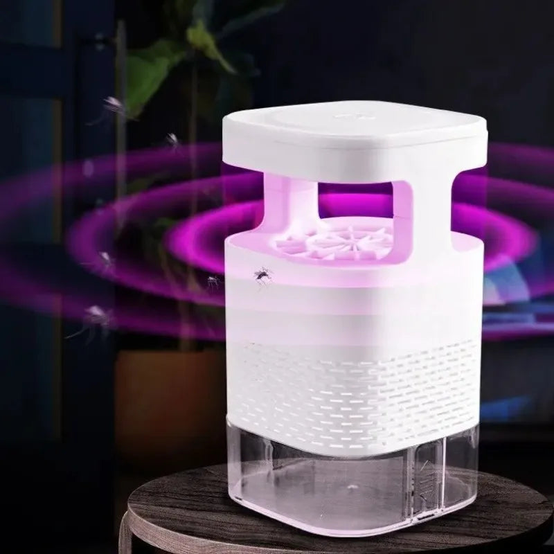 White electronic mosquito killer on a dark background with purple lights.