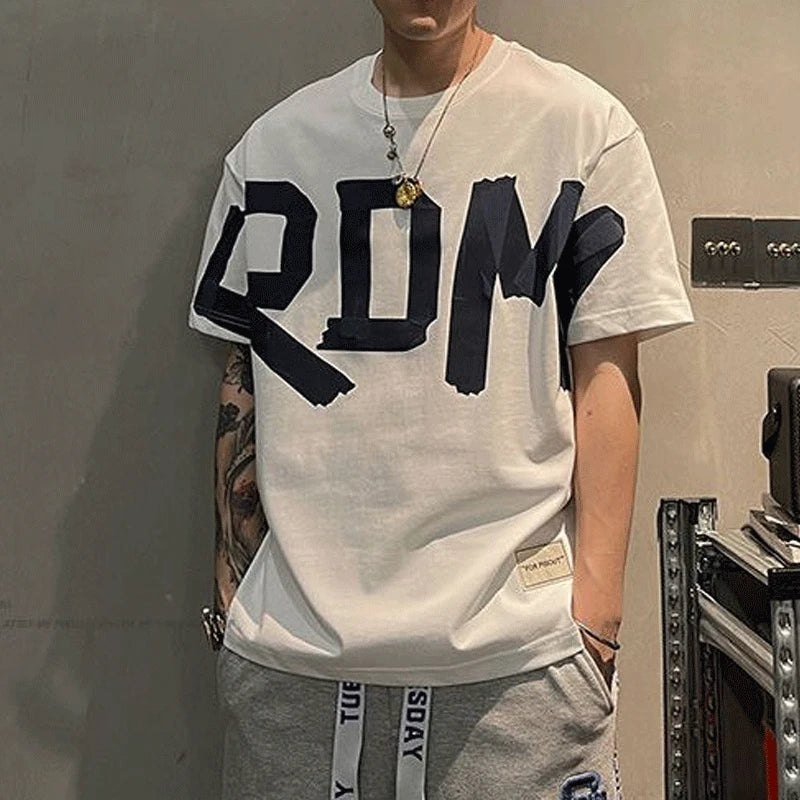 Model wearing a white t-shirt with 'FRDM' FREEDOM print art design funky cool streetwear urban skater